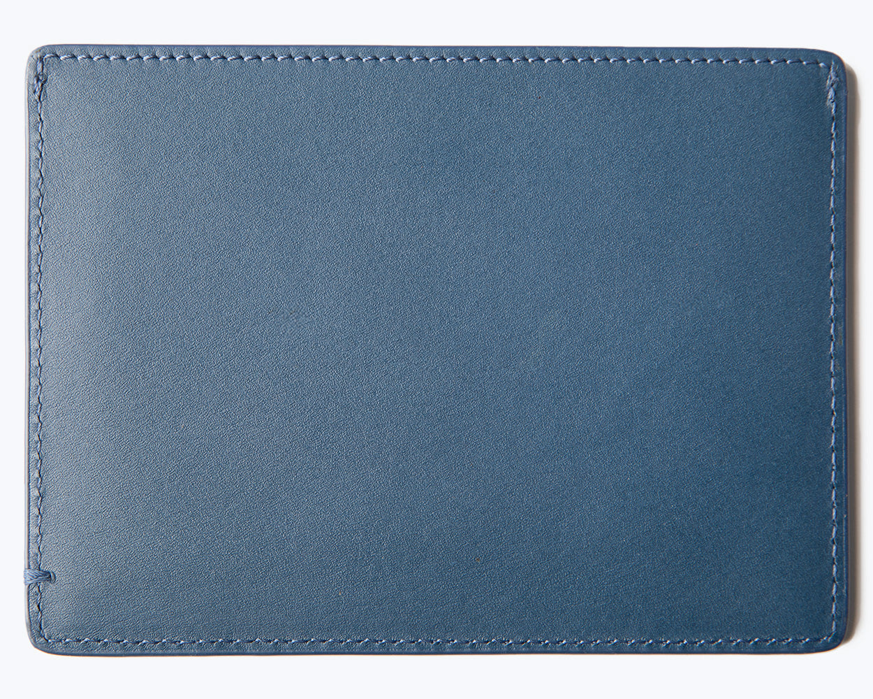 LEATHER PASSPORT HOLDER - THE ESSENTIAL COLLECTION